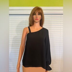 One sleeved black washable Three Eighty Two